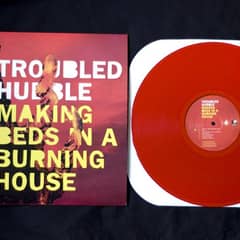 Making Beds In A Burning House