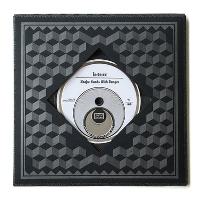 Tortoise - Shake Hands With Danger (Joyful Noise Recordings, JNR208-4) · 7", S/Sided, Single, Ltd, Whi