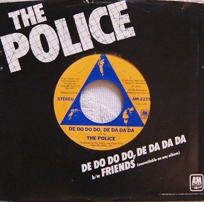 The Police - De Do Do Do, De Da Da Da / Friends (A&M Records, AM-2275) · 7" · Orange/Blue Labels