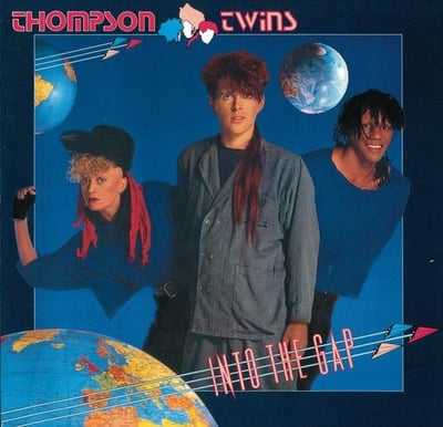 Thompson Twins - Into The Gap (Arista, AL 8-8200) · LP · 2nd Cover, Indianapolis Pressing · Repress