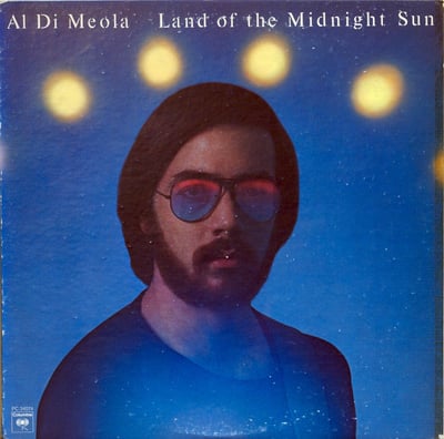 Al Di Meola - Land Of The Midnight Sun (Columbia, PC 34074) · LP · Terre Haute Pressing · VG+/VG+ · Reissue