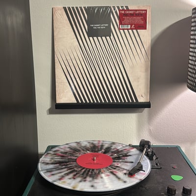 The Casket Lottery - Feel The Teeth (Iodine Recordings, IOD-91) • LP • Clear with Red, Black, White and Gold, Noise Cult Splatter • Club Edition, Limited Edition