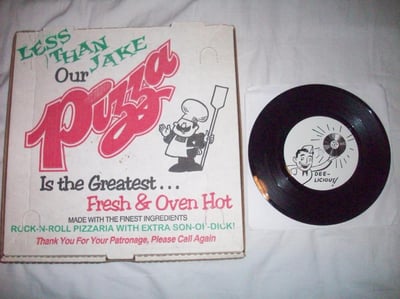 Rock 'N' Roll Pizzeria (Pizza Box) - Black 7" Vinyl.