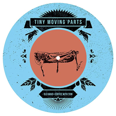 Tiny Moving Parts – Old Maid + Coffee With Tom (Skeletal Lightning, 2013) [2016 reissue, 4th pressing, Coke Bottle Clear With White Ink]