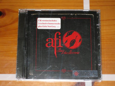 AFI Sing the Sorrow 2003 DreamWorks UK edition – Red