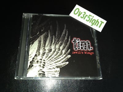 Tim. - Devil's Wings (2004) Spawner Records