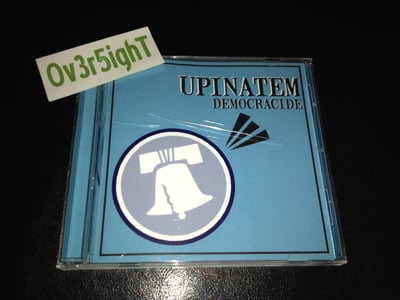 Upinatem - Democracide (2008) 1332 Records