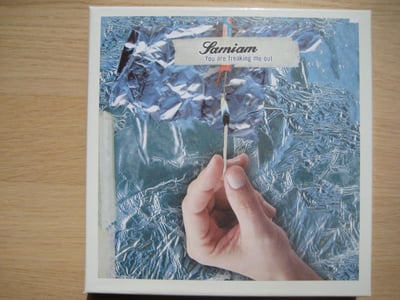 Samiam: You Are Freaking Me Out 4x7'' box set (Beri Beri Records / coke bottle clear + orange + white + clear / CD booklet & tray / repress) #1,710/2,000