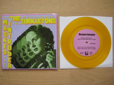 Masked Intruder / The Turkletons: Split 7'' (Hang Up Records, Lost Cat Records & Rad Girlfriend Records 2013 / yellow / 2nd press) /100