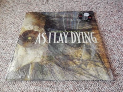 As I Lay Dying | An Ocean Between Us | 2007 | Toxic Green | /1000 | Sealed