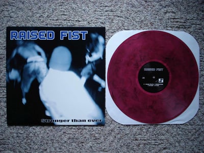 Raised Fist - Stronger Than Ever (Purple w/ Black Swirl) /?