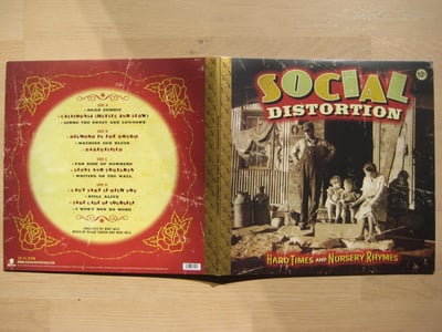 Social Distortion: Hard Times And Nursery Rhymes 2xLP (Epitaph Records 2010 / yellow / poster / CD / gatefold) /1,000