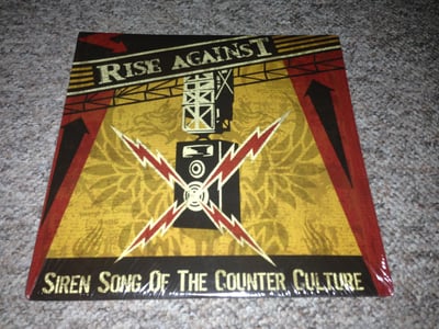 Rise Against | Siren Song Of The Counter Culture | 2004 | Black - Promo | Sealed