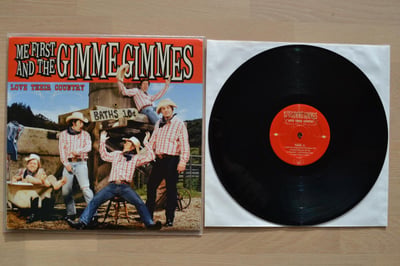 Me First And The Gimme Gimmes: Love Their Country (Fat Wreck Chords 2006 / black)