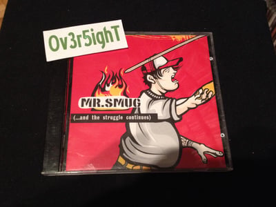 Mr. Smug - ...And The Struggle Continues (2003) Reject Records