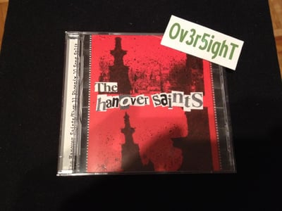The Hanover Saints & Shop 11 Phoenix - 10 Song Split (2002) Revolution Ink Records