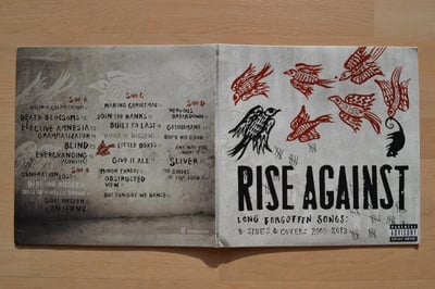 Rise Against: Long Forgotten Songs - B-Sides & Covers 2000 - 2013 2xLP (Interscope Records 2013 / white / gatefold / download code) /700