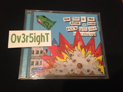 You Me And The Atom Bomb & Fuck With Fire - Bombs Away Split (2005) Cat N' Cakey Records