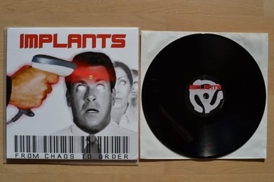 Implants: From Chaos To Order (Cyber Tracks 2013 / black / lyric sheet)