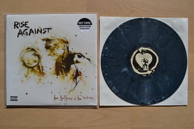 Rise Against: The Sufferer And The Witness (Geffen Reecords 2006 / white with black swirl / 180g / repress) /2,000