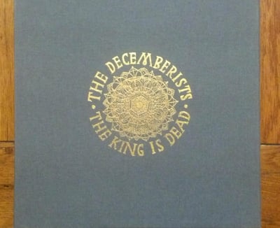 The Decemberists - The King Is Dead (White // Special Edition Box Set with Photobook, unique polaroid/watercolor, and copy of "Pendarvia" film)