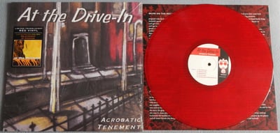 At The Drive-In - Acrobatic Tenement | Transgressive, trans-154x | clear red