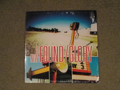 A New Found Glory - From The Screen To Your Stereo 10" (Baby Blue Marble Vinyl) Etched #: 434/450