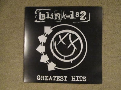 Blink 182 - Greatest Hits Double LP 12" (Translucent w/ Black & Silver Splatter Vinyl)