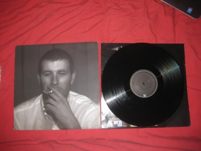 Arctic Monkeys "Whatever People Say I am that's what I'm not" Domino Records- ?? Press. Black/????