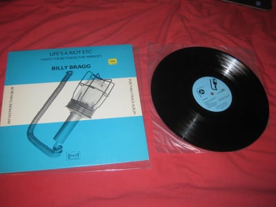 Billy Bragg "Life's a Riot, Etc. (With Between the Wars EP)" CD Presents, Ltd. ?? Press. Black/????
