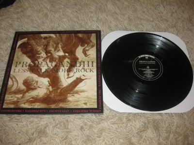 Propagandhi "Less Talk, More Rock" Fat Wreck Chords. ?? Press. Black/????