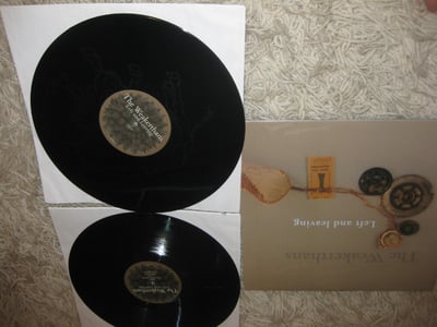 The Weakerthans "Left and Leaving" Epitaph. ?? Press. 2x LP w Buffalo Etching on side D. Black/????