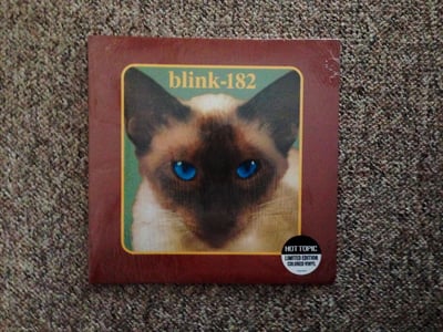 blink-182 | Cheshire Cat | 2014 | Clear w/ Blue/Yellow Splatter | /2700 | Sealed