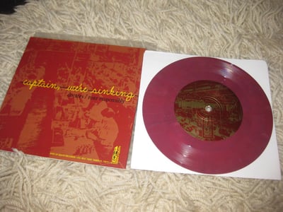 Captain, We're Sinking/ Timeshares. Kiss of Death Records. 1st Press. Red/Purple mix/500