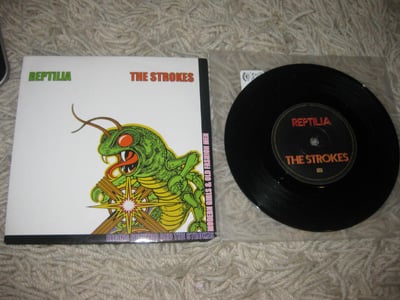 The Strokes "Reptilia" - Rough Trade. ??Press. Black/???
