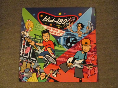 Blink 182 - The Mark, Tom, and Travis Show (The Enema Strikes Back!) Double LP (Clear w/ Red & Blue Splatter Vinyl)