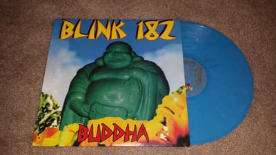 blink-182 - Buddha | Vibrant Blue (Newbury Comics exclusive) | /750 | 2015 | 78765-1