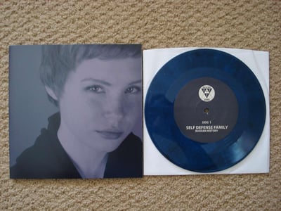 Self Defense Family/Meredith Hunter - Split (Blue) /800