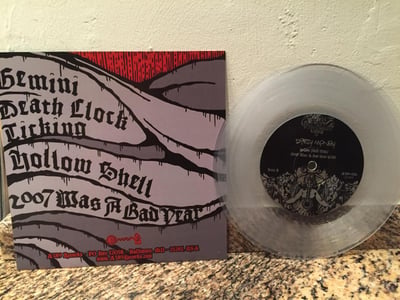 7" - Trapped Under Ice / Dirty Money - Split - Clear - 1st press /150