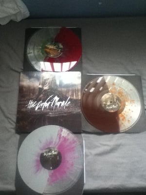The Color Morale - Triple Lp Set - /1000 - (We All Have Demons - Clear/Red Split w/ Orange Splatter Vinyl)(My Devil In Your Eyes - Clear/Brown Split w/ Orange Splatter Vinyl)(Know Hope - Clear/Gray Split w/ Purple Splatter Vinyl)