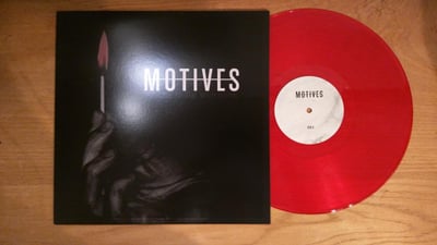 Motives - This World, Not Dead, Merely Sleeping (Transparent Red, /500)