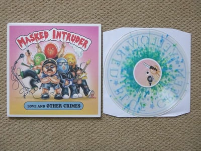 Masked Intruder - Love And Other Crimes (Clear w/ Kelly Green/Cyan Blue/Yellow Splatter) /500