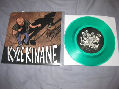 The Slow Death / Kyle Kinane "Under The Table #2" Rad Girlfriend Records/Silver Sprocket Bicycle Club. 2nd Press. Skunk Green/???
