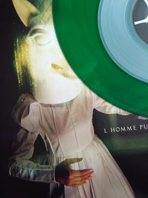 # L'HOMME PUMA | on remplace les yeux cassés | communication is not words / things get worse | 2009 | 12"+7", vinyles vert transparent et transparent