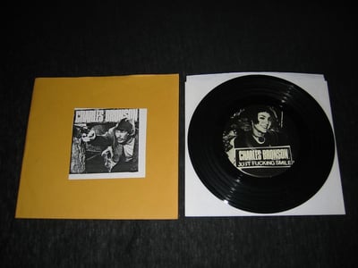 Charles Bronson / Unanswered (1st Press /1000 black, manila folder cover w/glued logos)