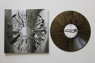 Carcass - Surgical Steel LP on brown with black splatter