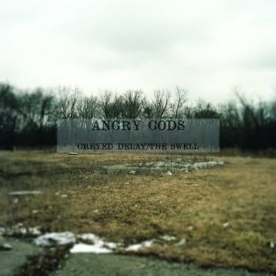Angry Gods - Greyed Delay/The Swell (Black /5000)