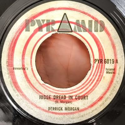 PYR 6019 - Derrick Morgan - Judge Dread In Court - Pyramid (2) - 7", Single, 3-P - 0 - 6685553 - Ska, Reggae - 2024-11-18 02:40:19 - Very Good (VG) - Generic