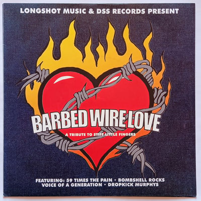 DSS030, none - Various - Barbed Wire Love - A Tribute To Stiff Little Fingers - DSS Records, Longshot Music - 7" - 5 - 1999 - 3168962 - Punk - 2016-09-12 21:21:35 - Near Mint (NM or M-) - Near Mint (NM or M-)