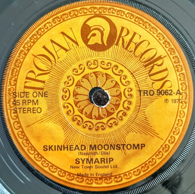 TRO 9062 - Symarip - Skinhead Moonstomp / Skinhead Jamboree - Trojan Records - 7", Single, RE, Yel - 1980 - 2175717 - Ska, Reggae - 2022-12-27 14:43:59 - Very Good Plus (VG+) - Generic